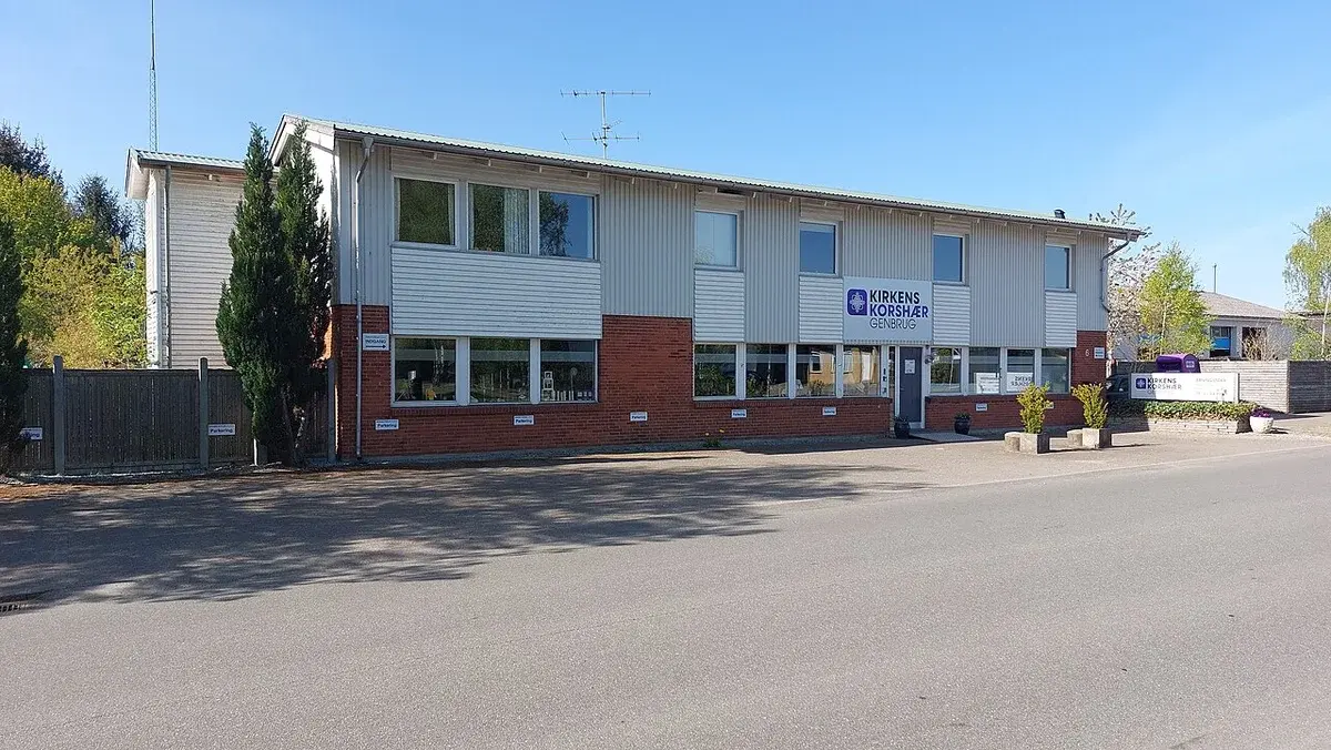 Exterior of a Kirkens Korshær Genbrug second-hand store in Ry, Denmark.